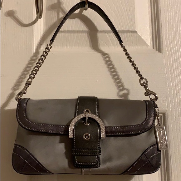 Coach Handbags - Coach silver leather Clutch